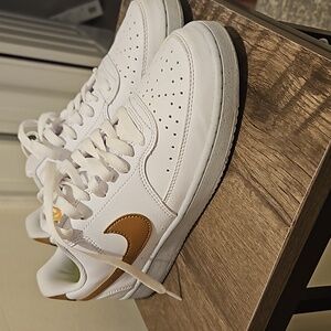 Women's gold and white 8.5 Nike sneakers